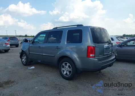 2009 Honda Pilot Touring z USA, uszkodzony, nr VIN 5FNYF48919B054921